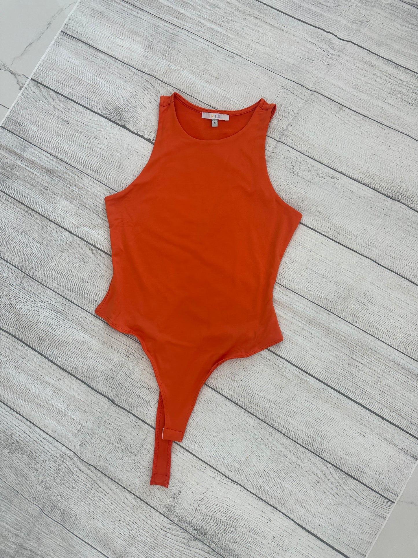 orange bodysuit